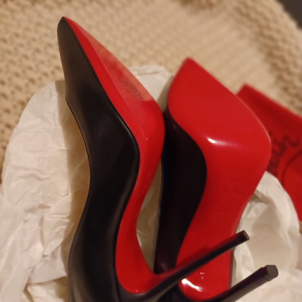 Christian Louboutin black heels never worn